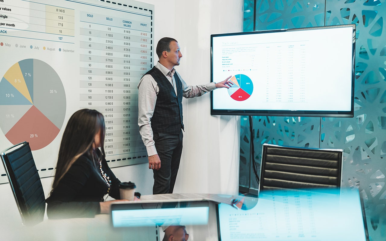 business-meeting-in-a-boardroom-min business meeting in a boardroom min